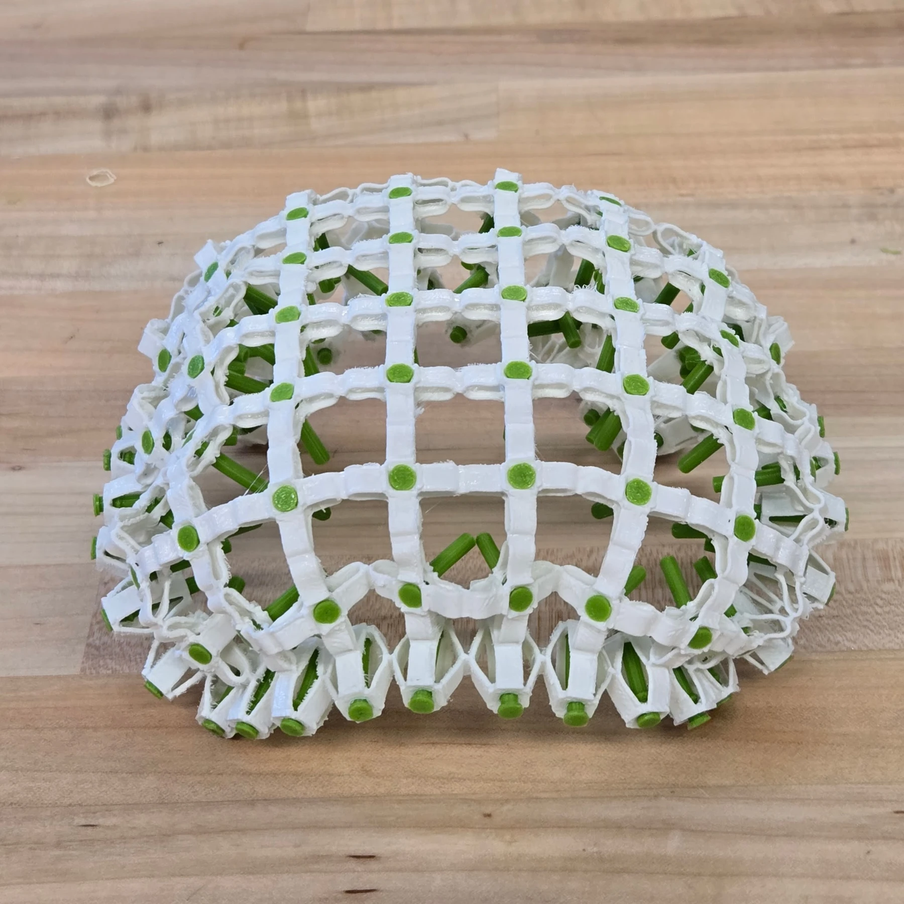 A dome formed by a pin-configured Sarrus array