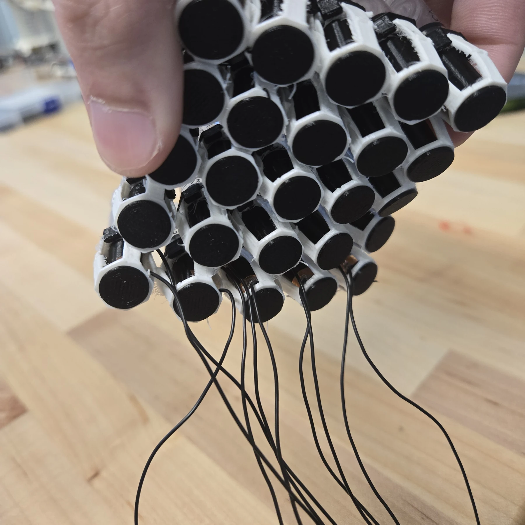 Underside of the assembled syringe array with printed mounts and connections