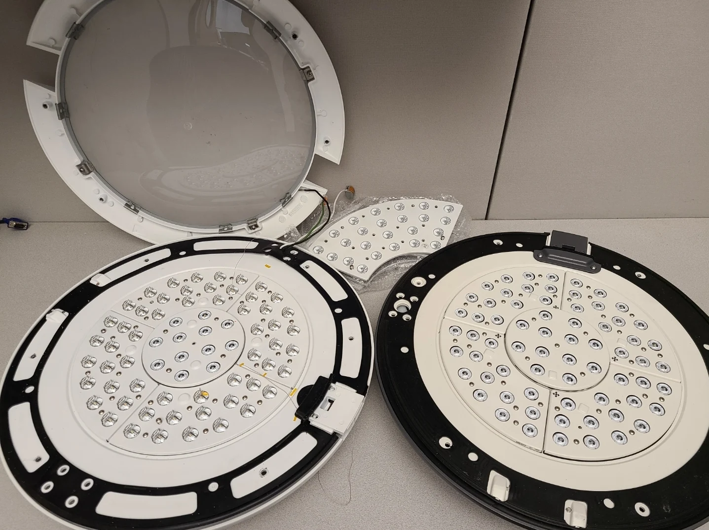 Open luminaire enclosure with LED boards and wiring