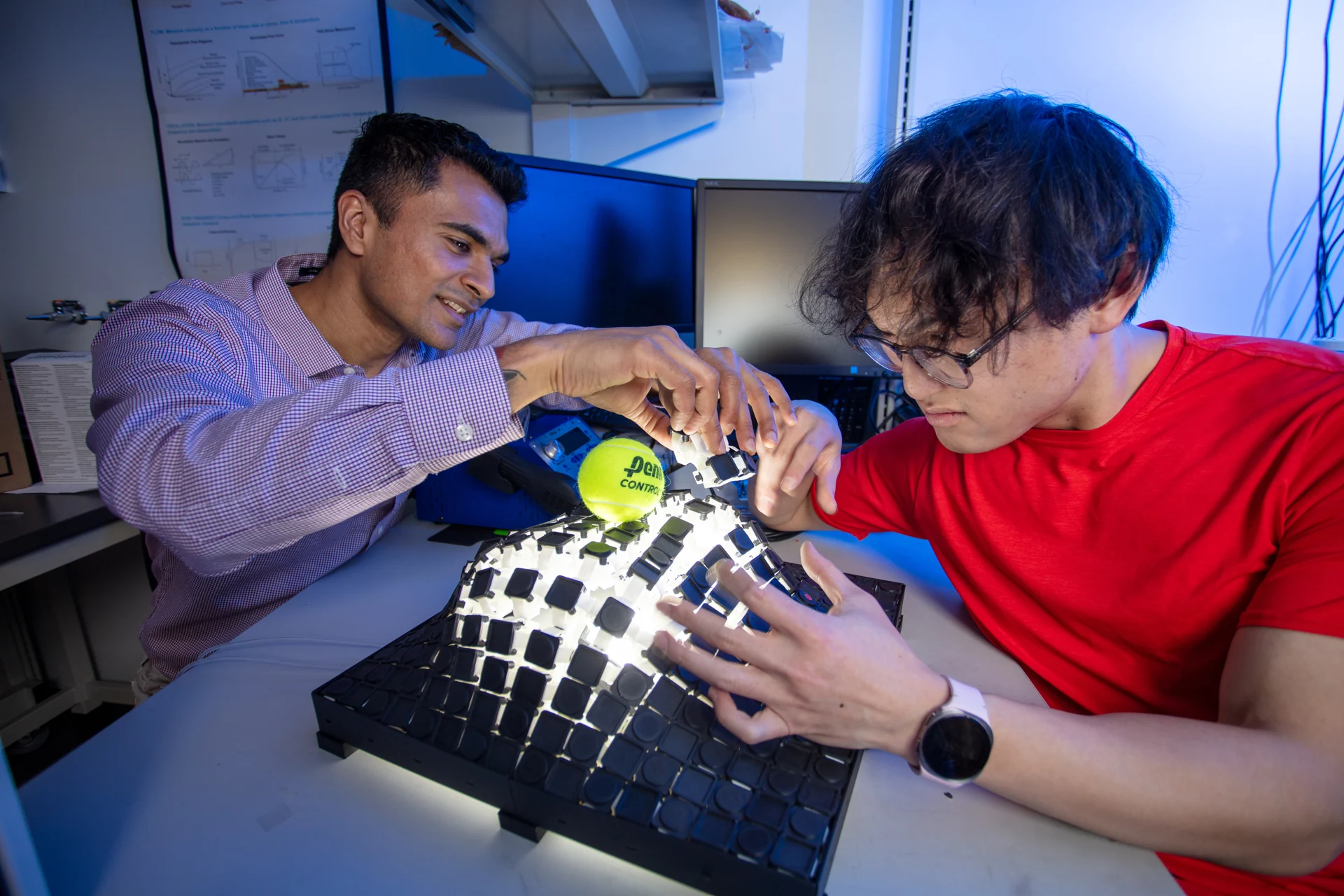Working with a raised cellular surface and an individual printed module at the WPI lab bench